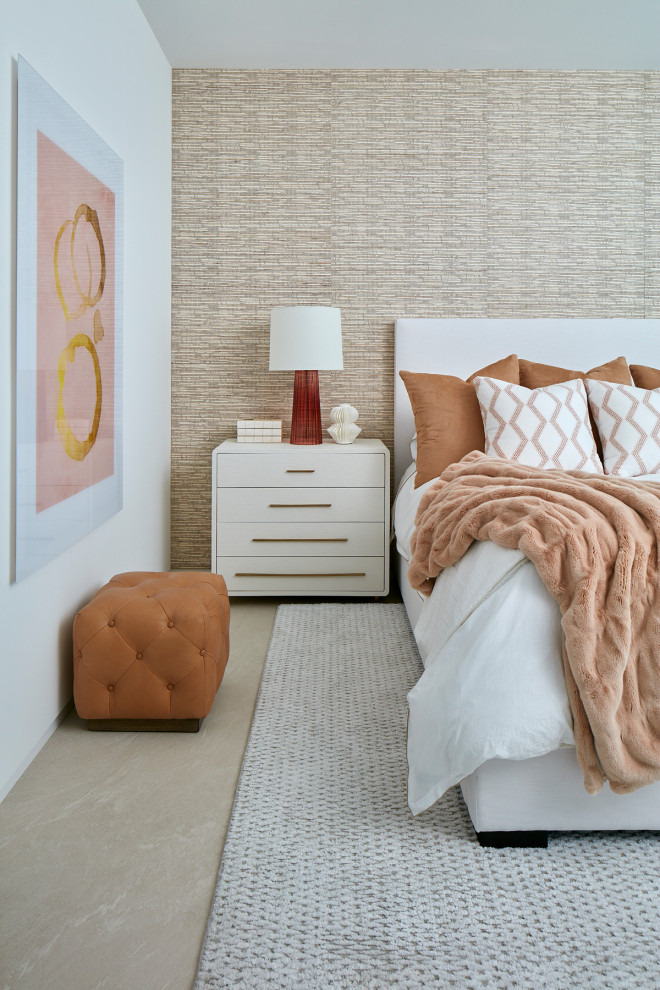 Inspiration for a contemporary bedroom in Miami with beige walls and beige floors.