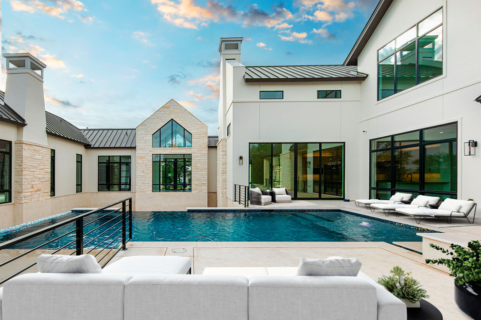 Inspiration for a transitional pool remodel in Austin