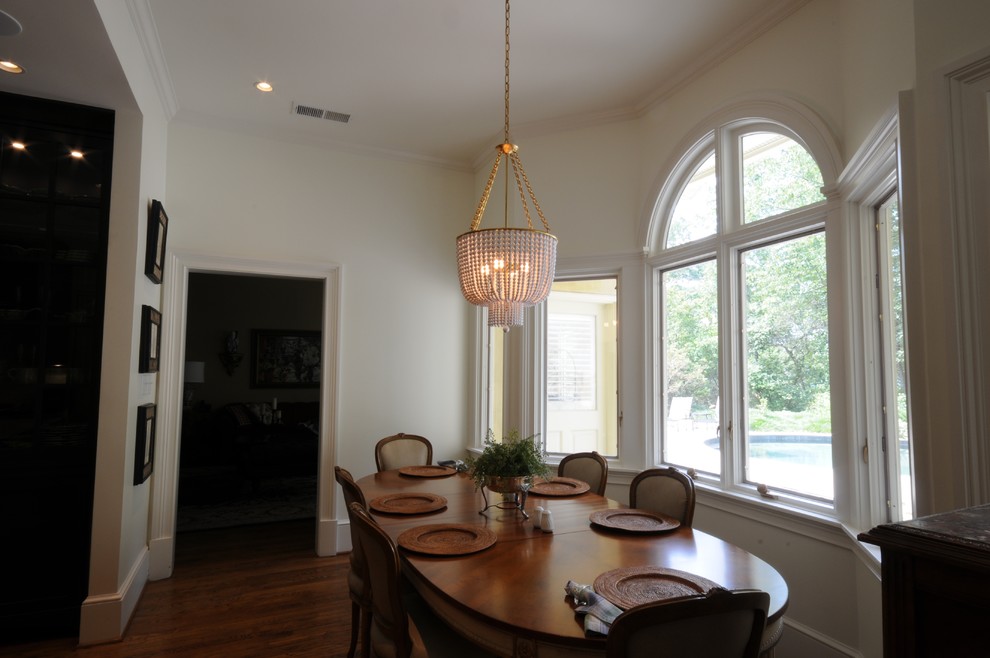 Inspiration for a large transitional u-shaped dark wood floor and brown floor open concept kitchen remodel in Birmingham with an undermount sink, shaker cabinets, white cabinets, granite countertops, white backsplash, mosaic tile backsplash, paneled appliances and an island