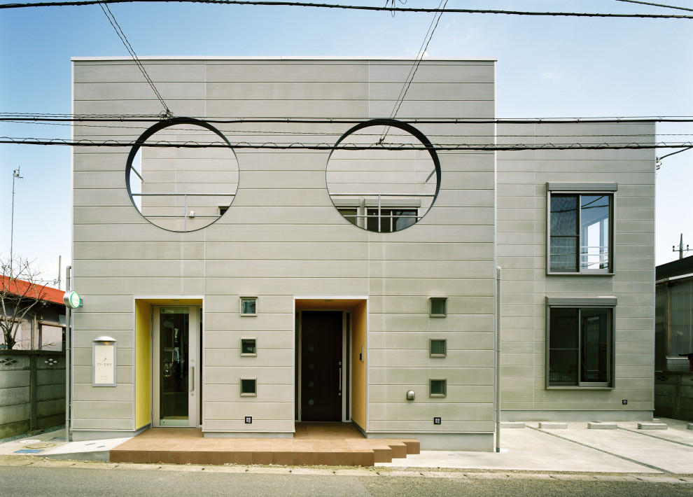 他の地域にある中くらいなモダンスタイルのおしゃれな家の外観 (コンクリート繊維板サイディング) の写真