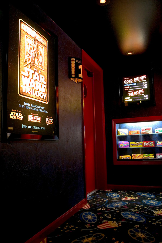 Home theater - contemporary home theater idea in Grand Rapids