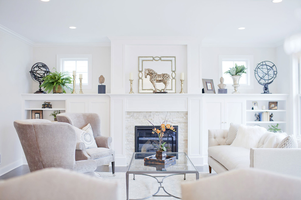 Inspiration for a mid-sized transitional formal enclosed living room in Minneapolis with white walls, a standard fireplace, dark hardwood floors and a stone fireplace surround.