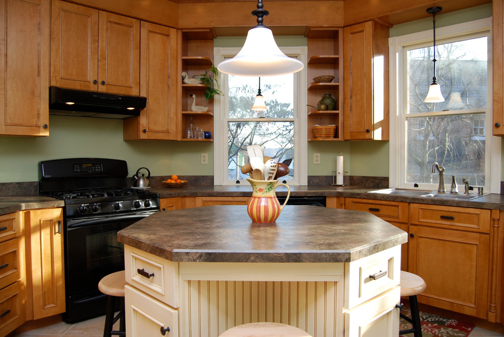 Design ideas for a mid-sized country u-shaped eat-in kitchen in Philadelphia with a double-bowl sink, beaded inset cabinets, light wood cabinets, laminate benchtops, black appliances, ceramic floors and with island.