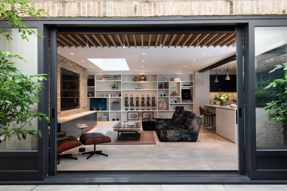 Источник вдохновения для домашнего уюта: гостиная комната среднего размера в современном стиле с бетонным полом и серым полом