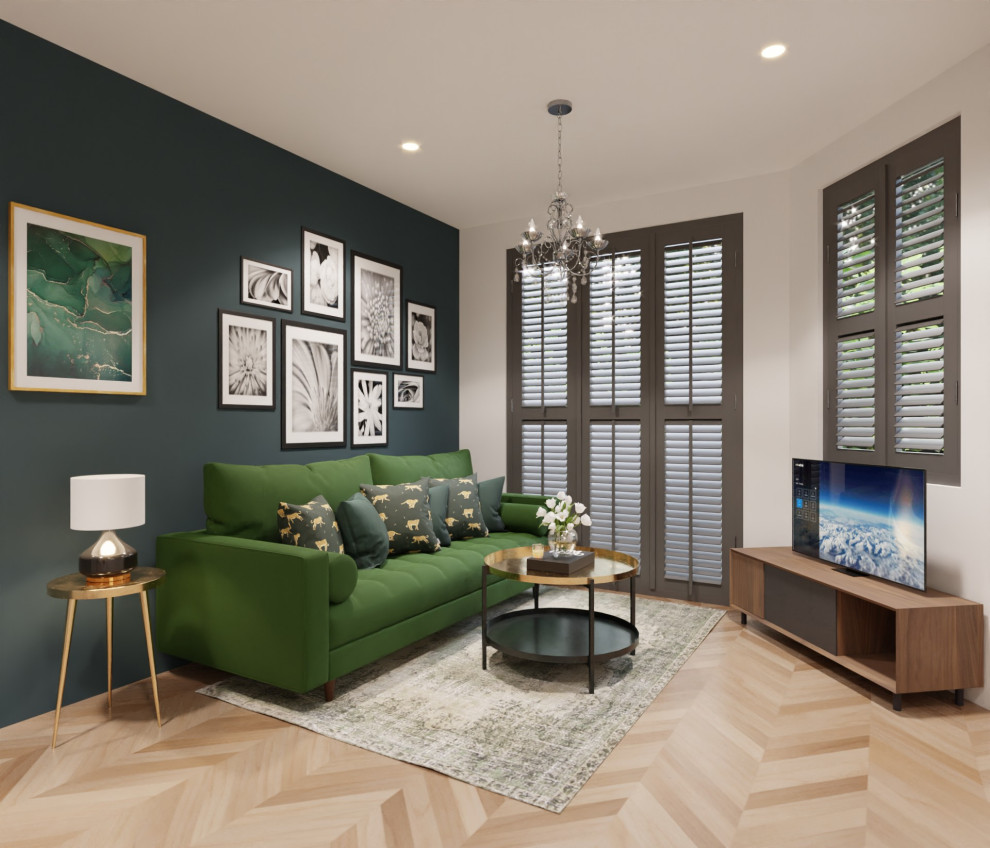 This is an example of a small modern living room in Surrey with light hardwood floors.
