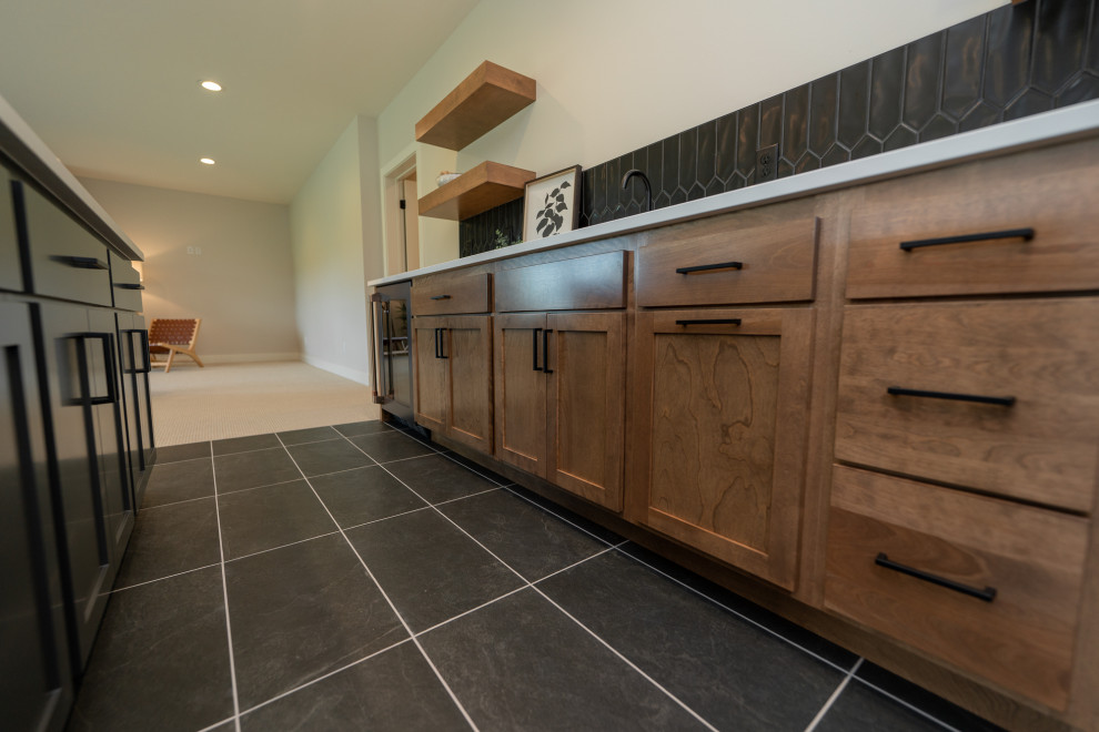Wet bar - rustic wet bar idea with flat-panel cabinets