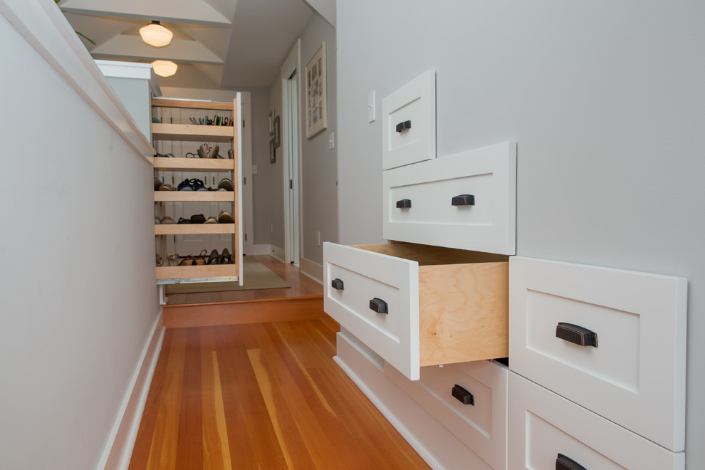 Mid-sized arts and crafts hallway in Seattle with grey walls and medium hardwood floors.