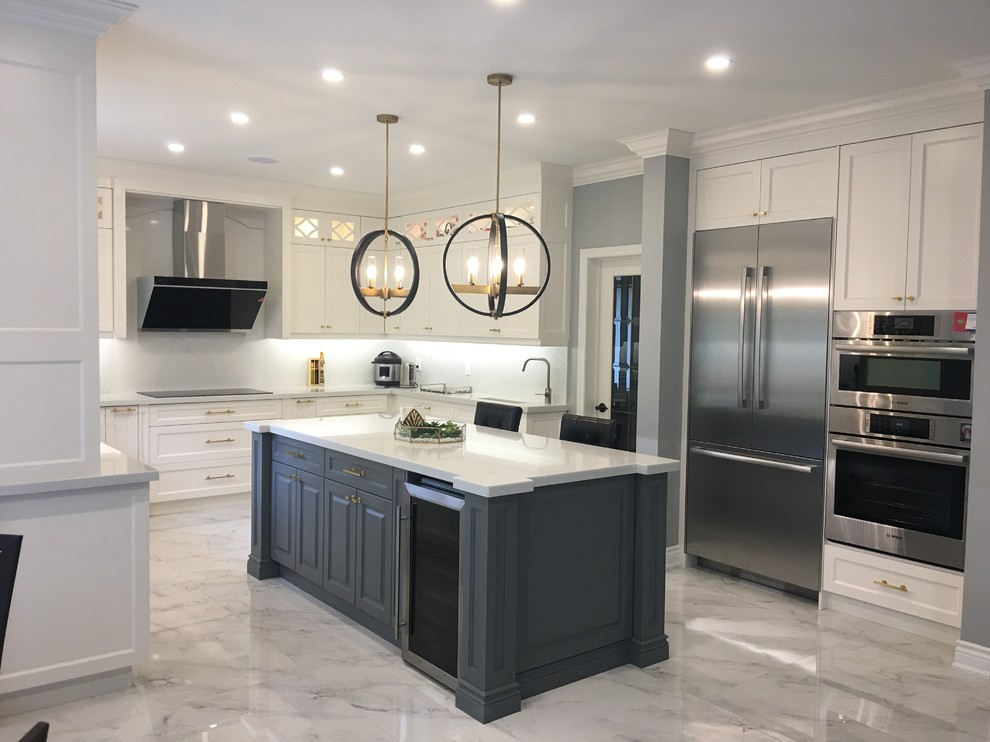 This is an example of a mid-sized traditional u-shaped eat-in kitchen in Toronto with an undermount sink, recessed-panel cabinets, white cabinets, quartz benchtops, white splashback, stone slab splashback, stainless steel appliances, porcelain floors, with island, white floor and white benchtop.