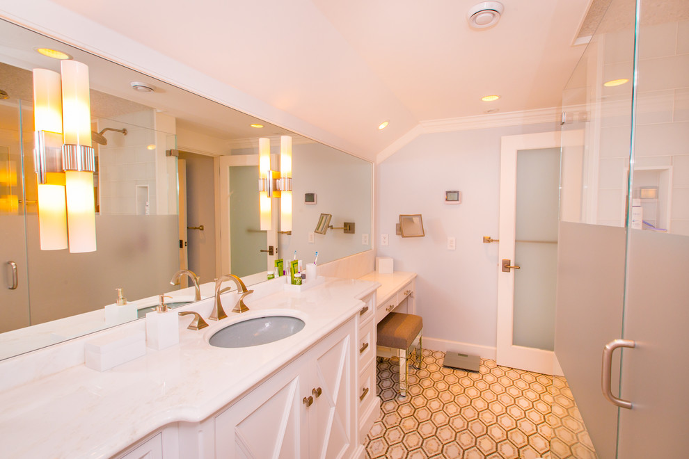 Large contemporary master bathroom in New York with furniture-like cabinets, white cabinets, a double shower, a one-piece toilet, multi-coloured tile, mosaic tile, multi-coloured walls, mosaic tile floors, an undermount sink, quartzite benchtops, beige floor and a hinged shower door.
