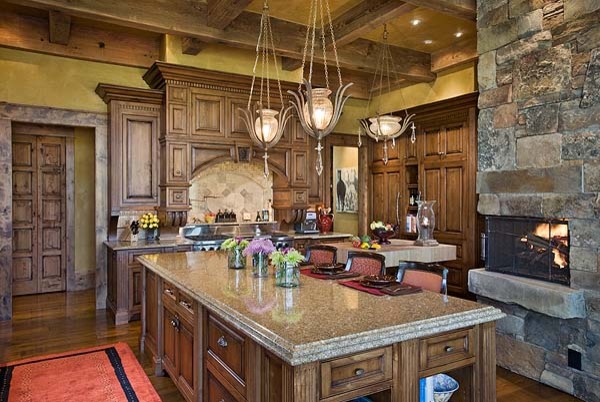 Mountain style light wood floor eat-in kitchen photo with beaded inset cabinets, light wood cabinets, paneled appliances and an island