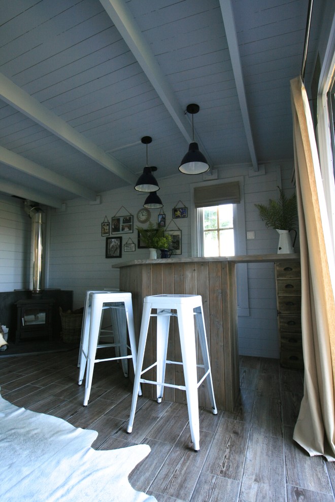 Design ideas for a large scandinavian detached shed and granny flat in Other.