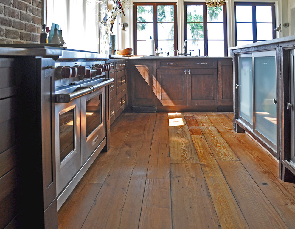 Kitchen - rustic medium tone wood floor kitchen idea in Atlanta