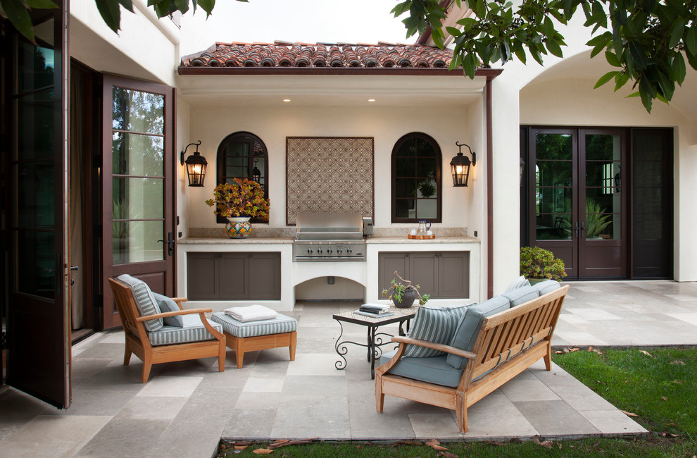 Design ideas for a mediterranean patio in San Diego with an outdoor kitchen and no cover.
