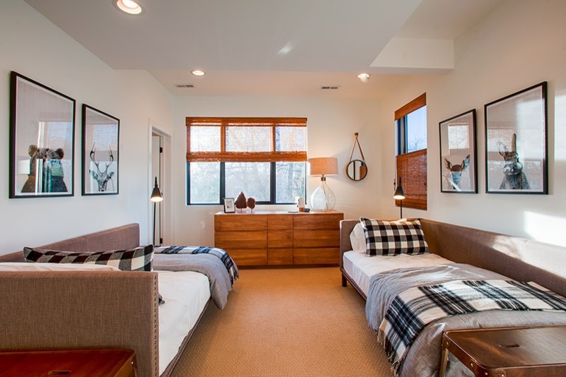 Design ideas for a mid-sized transitional guest bedroom in Denver with white walls, carpet, no fireplace and beige floor.