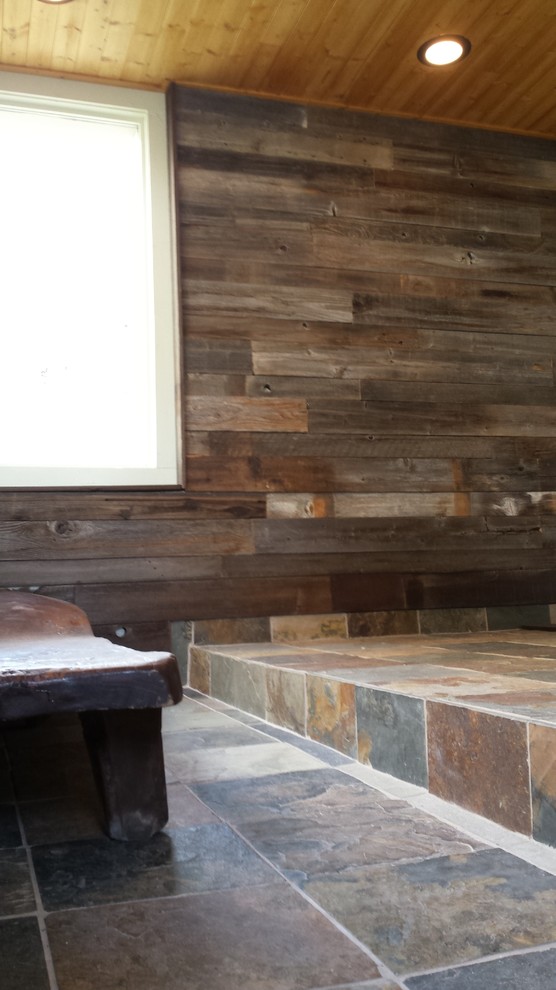 Inspiration for a large rustic master brown tile slate floor and multicolored floor home design remodel in Phoenix with white walls and a wall-mount sink