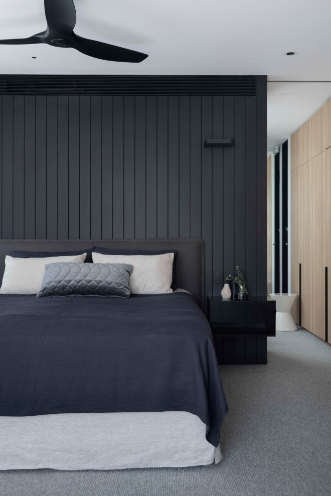 Photo of a midcentury bedroom in Sydney.