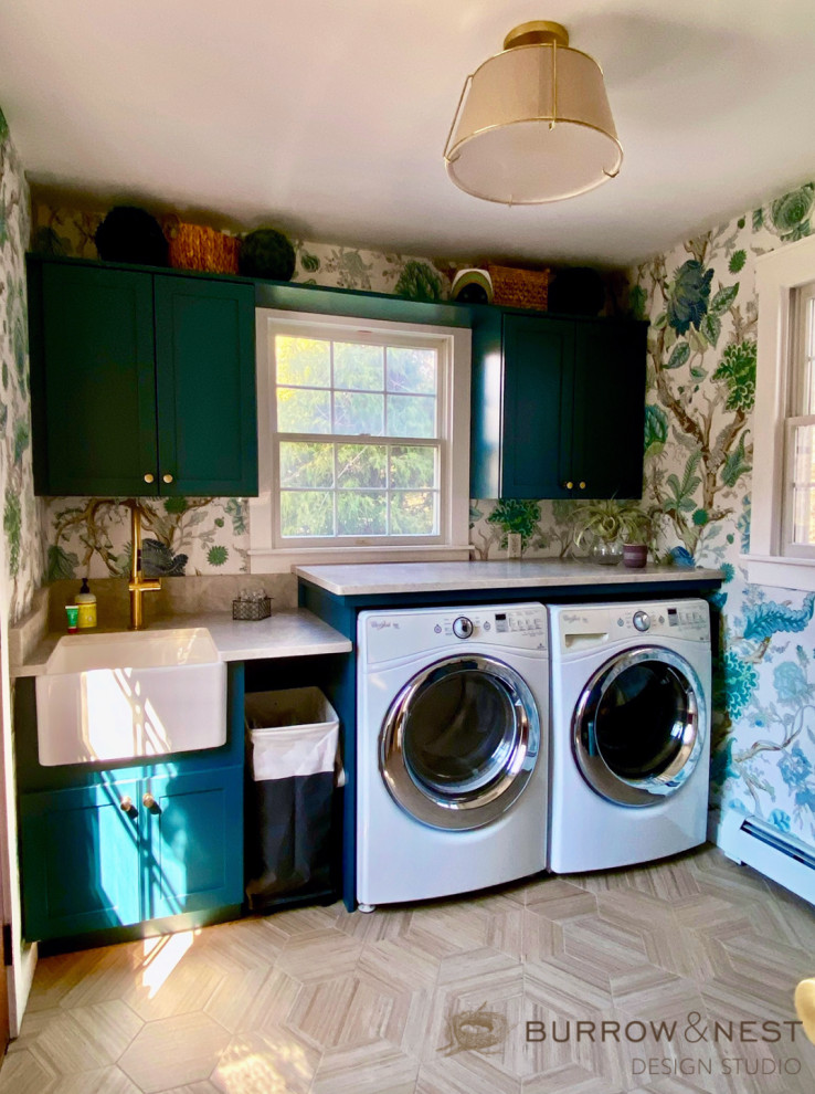 Inspiration for a farmhouse utility room in Providence with a belfast sink, turquoise cabinets, quartz worktops, a side by side washer and dryer, beige worktops and wallpapered walls.