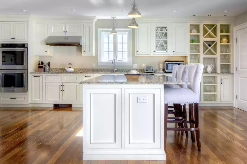 Example of a mid-sized classic home design design in Providence