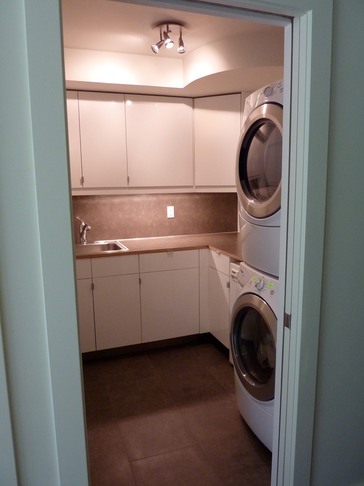 Inspiration for a mid-century modern laundry room remodel in Portland