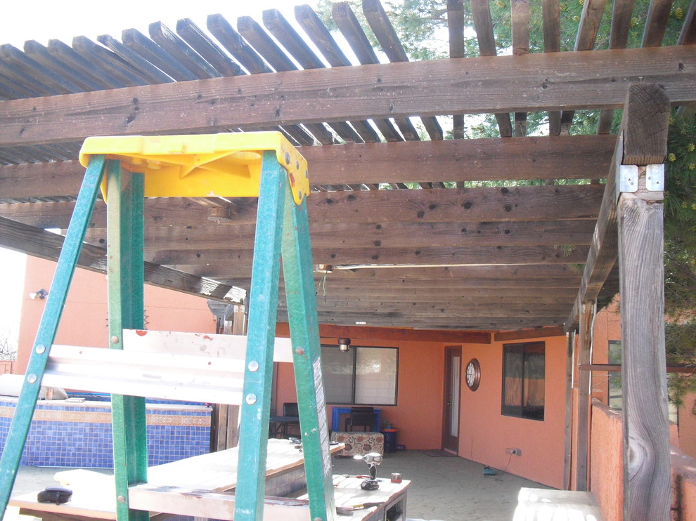 Example of a mountain style home design design in Phoenix