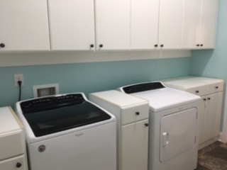 Laundry Room with Wall-Hung Cabinets and Counter Space