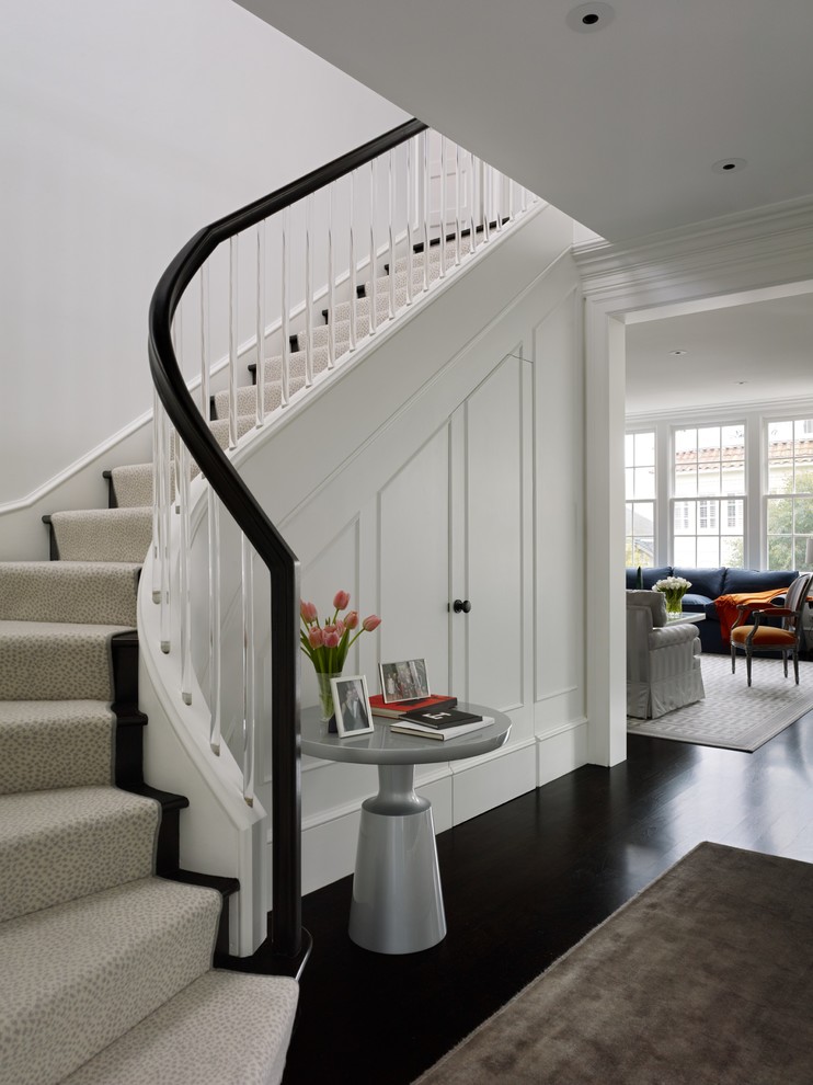 Inspiration for a transitional curved staircase in San Francisco.
