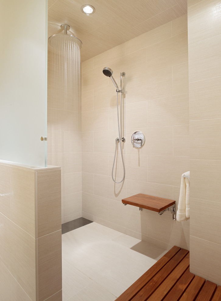 Photo of a contemporary bathroom in San Francisco with a curbless shower, beige tile, ceramic tile and beige walls.