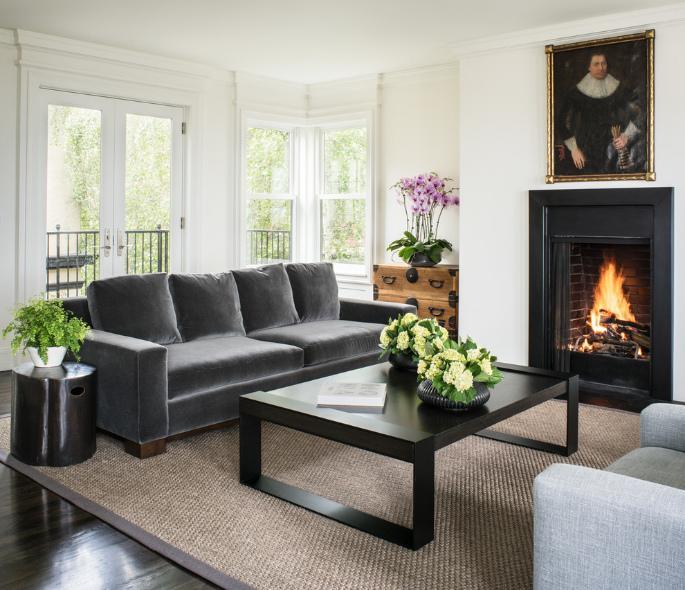 Inspiration for a transitional living room in San Francisco with white walls, dark hardwood floors, a standard fireplace, no tv and a brick fireplace surround.