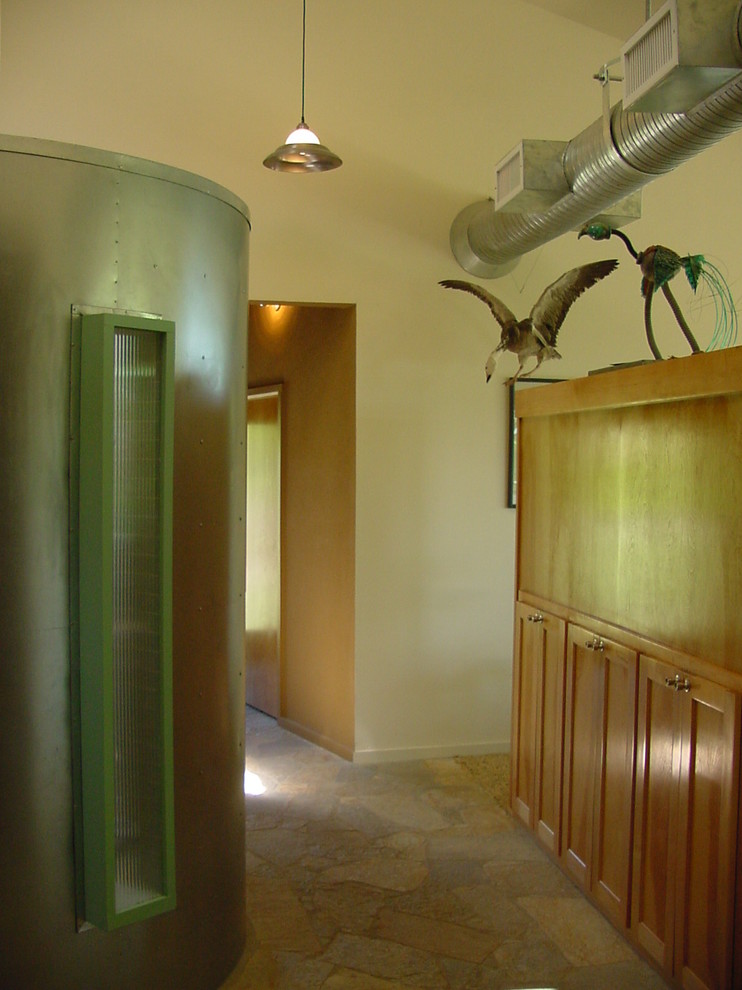 Example of an eclectic home design design in Austin