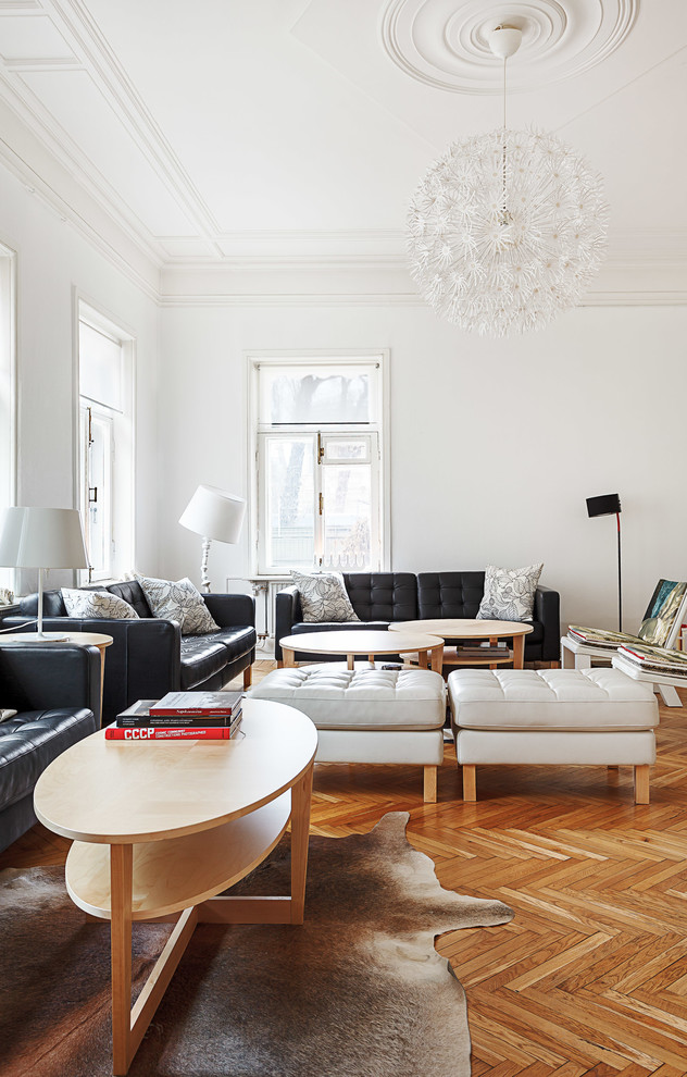 Inspiration for a scandinavian formal living room in Moscow with light hardwood floors and white walls.