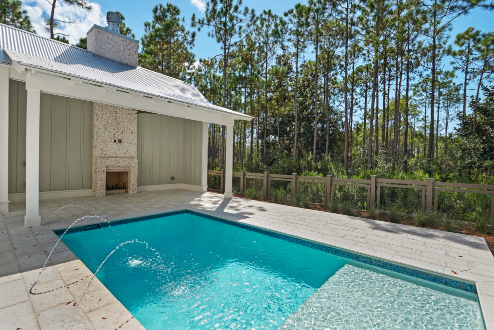 Design ideas for a small modern backyard rectangular pool in Miami with concrete pavers.