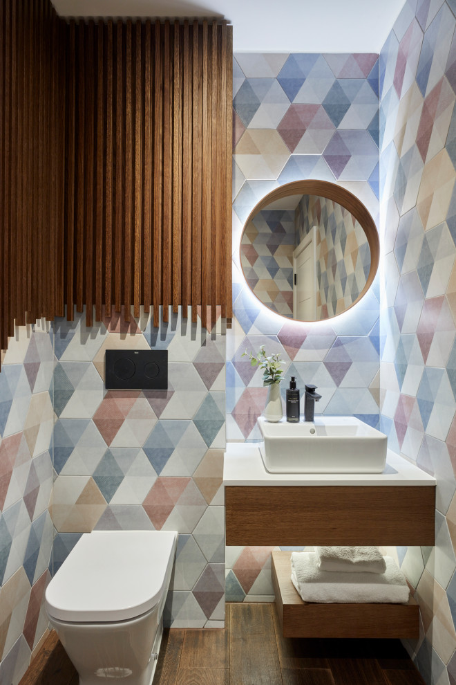 Design ideas for a contemporary powder room in London.