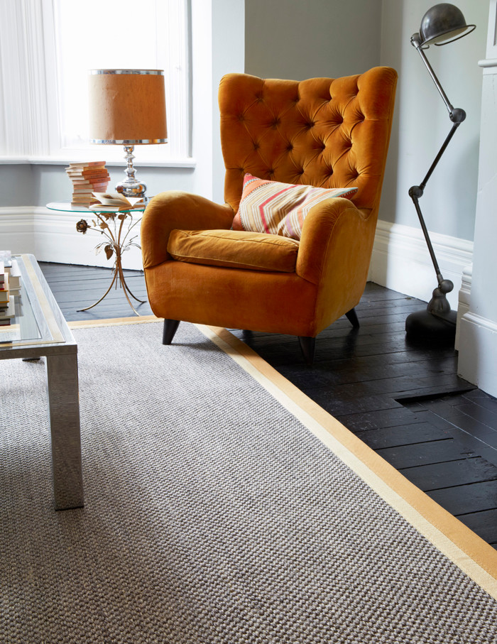 Design ideas for a contemporary living room in Hampshire with carpet.