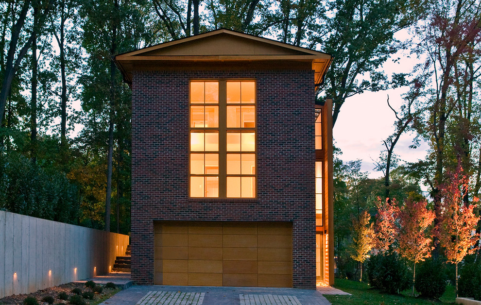 Inspiration for a mid-sized modern brick exterior in DC Metro with a gable roof.