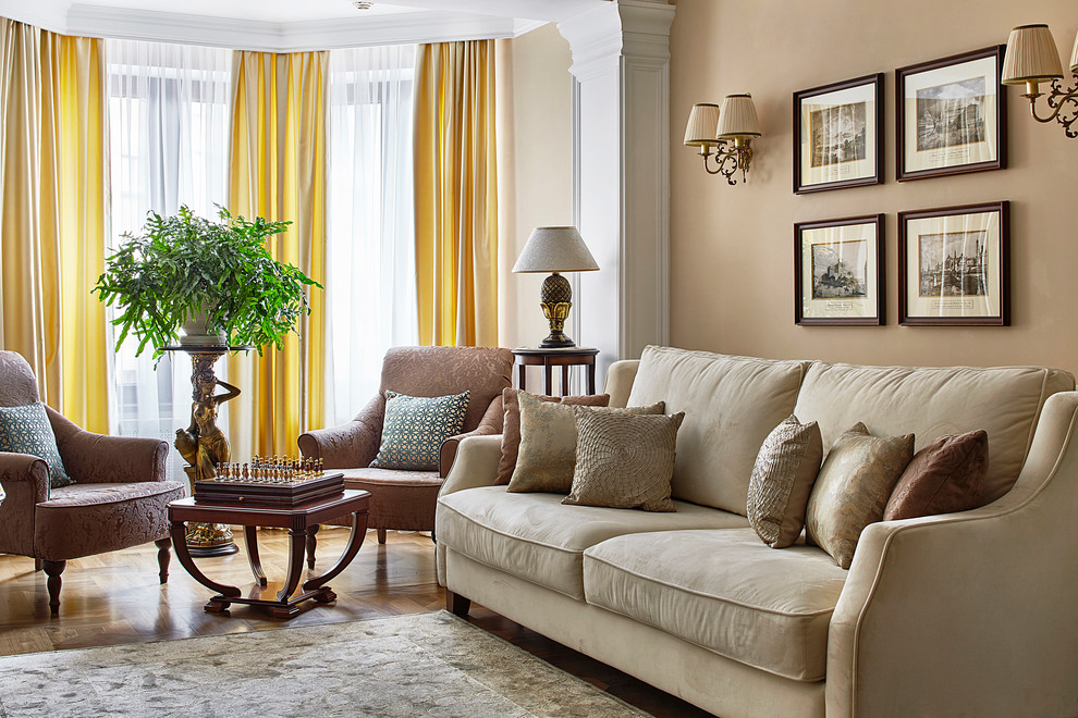 Design ideas for a transitional enclosed living room in Moscow with beige walls and carpet.