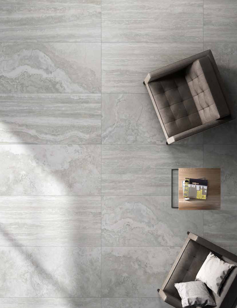 Contemporary living room with grey stone look porcelain tile ...