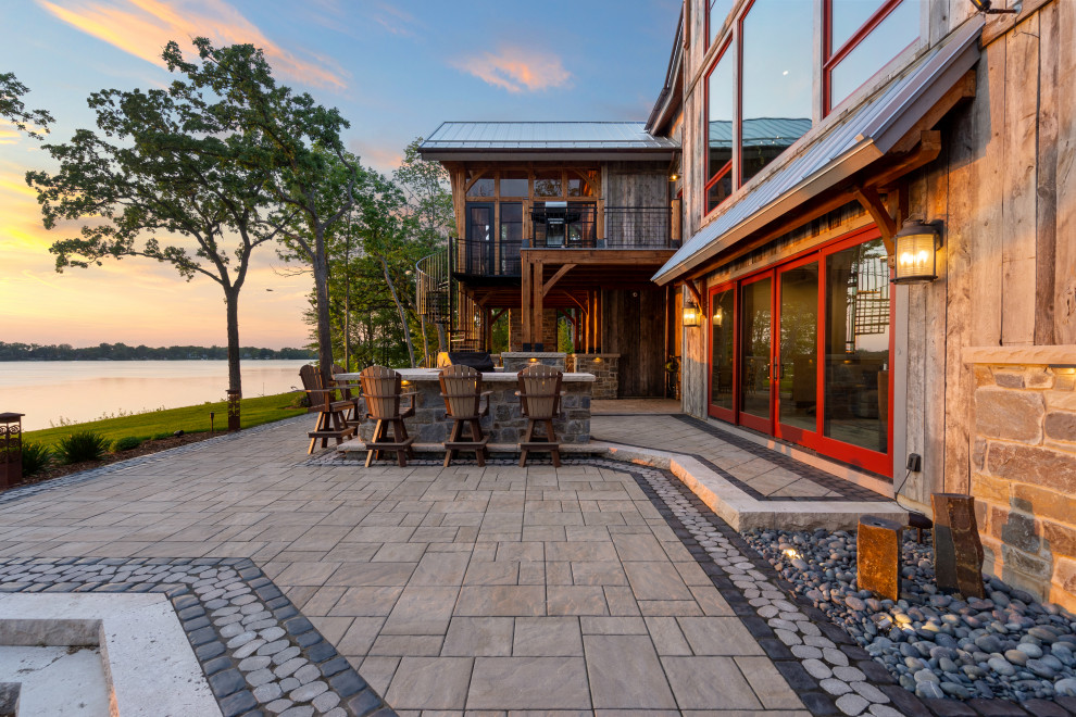 This is an example of a rustic patio in Milwaukee.