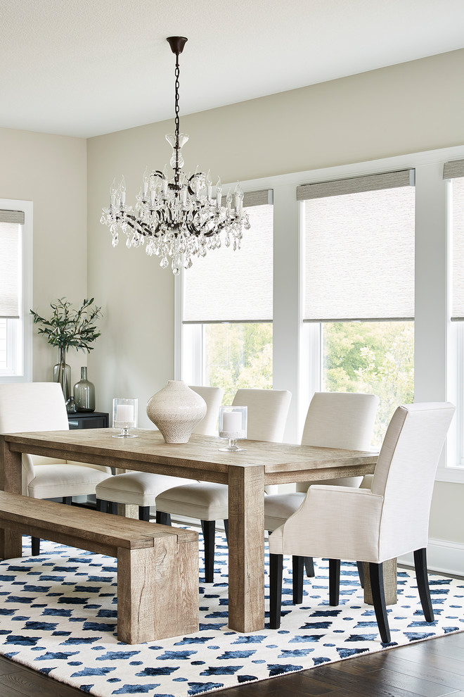 Transitional dining room in Minneapolis with beige walls, dark hardwood floors and brown floor.