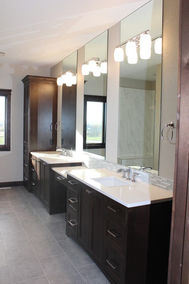 Inspiration for a large transitional master gray tile, white tile and matchstick tile porcelain tile bathroom remodel with shaker cabinets, dark wood cabinets, beige walls, an undermount sink and quartz countertops