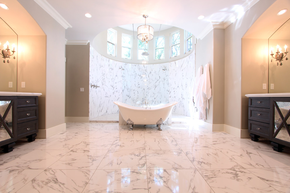 Inspiration for an expansive traditional master bathroom in Other with recessed-panel cabinets, grey cabinets, a claw-foot tub, an open shower, a two-piece toilet, white tile, porcelain tile, grey walls, porcelain floors, an undermount sink and engineered quartz benchtops.