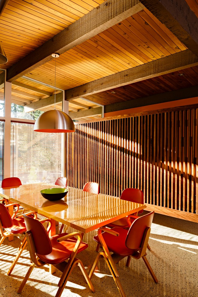 Example of a mid-sized 1960s concrete floor and multicolored floor dining room design in Portland