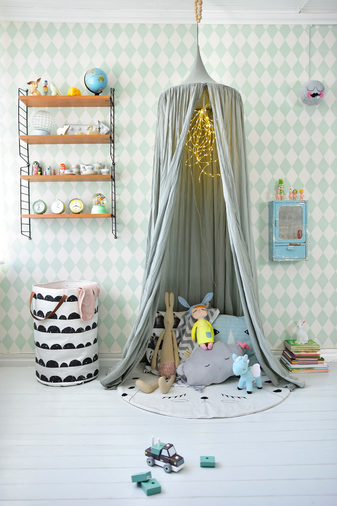 Design ideas for a mid-sized scandinavian gender-neutral kids' playroom for kids 4-10 years old in Other with multi-coloured walls, painted wood floors and white floor.