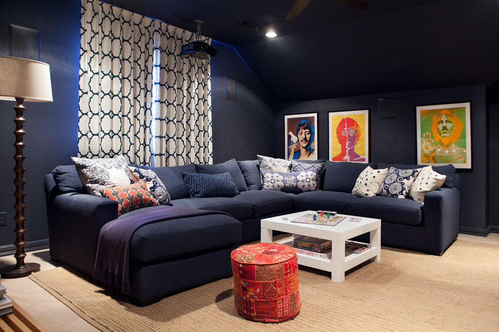 Mid-sized eclectic enclosed home theatre in Dallas with blue walls, carpet, beige floor and a projector screen.