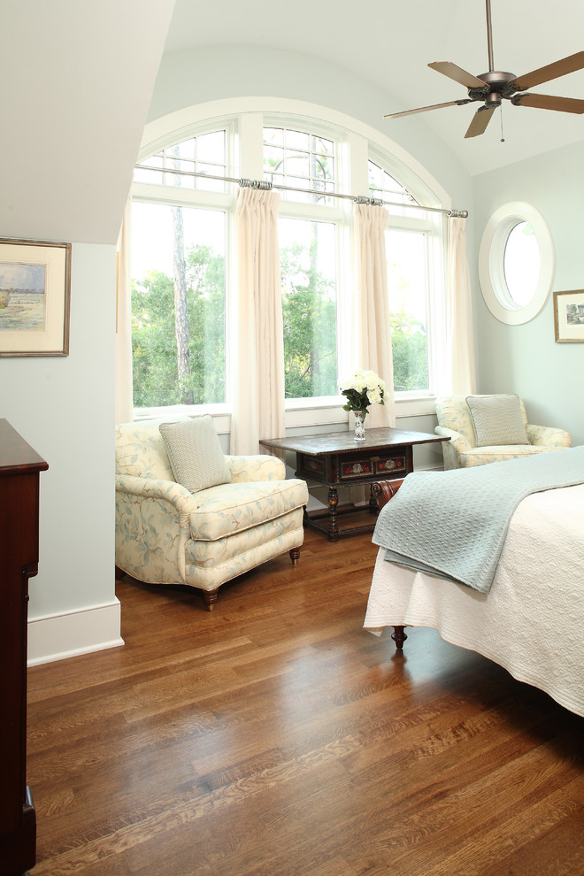 Design ideas for a traditional bedroom in Charleston with light hardwood floors.
