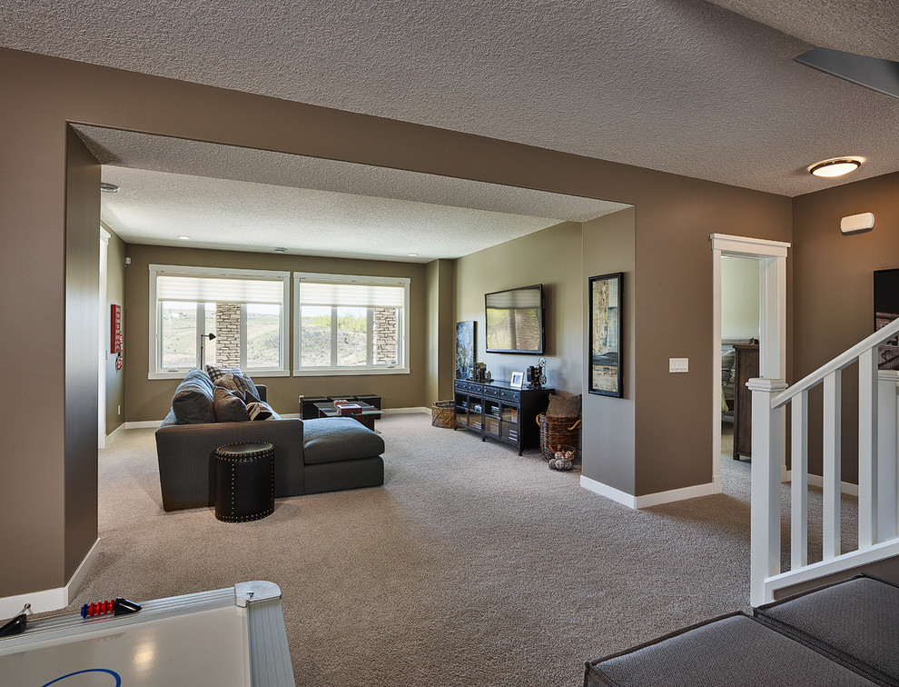 Inspiration for a mid-sized transitional walk-out carpeted basement remodel in Calgary with brown walls and no fireplace