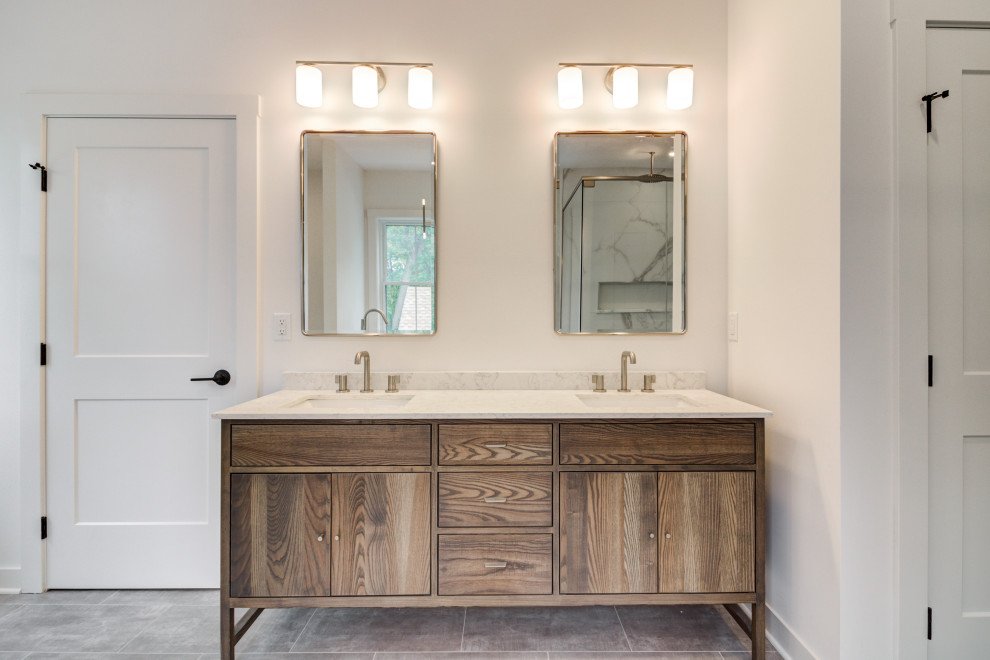 Transitional master bathroom in Cleveland with flat-panel cabinets, distressed cabinets, a freestanding tub, white tile, subway tile, white walls, ceramic floors, engineered quartz benchtops, grey floor, white benchtops, a double vanity and a freestanding vanity.