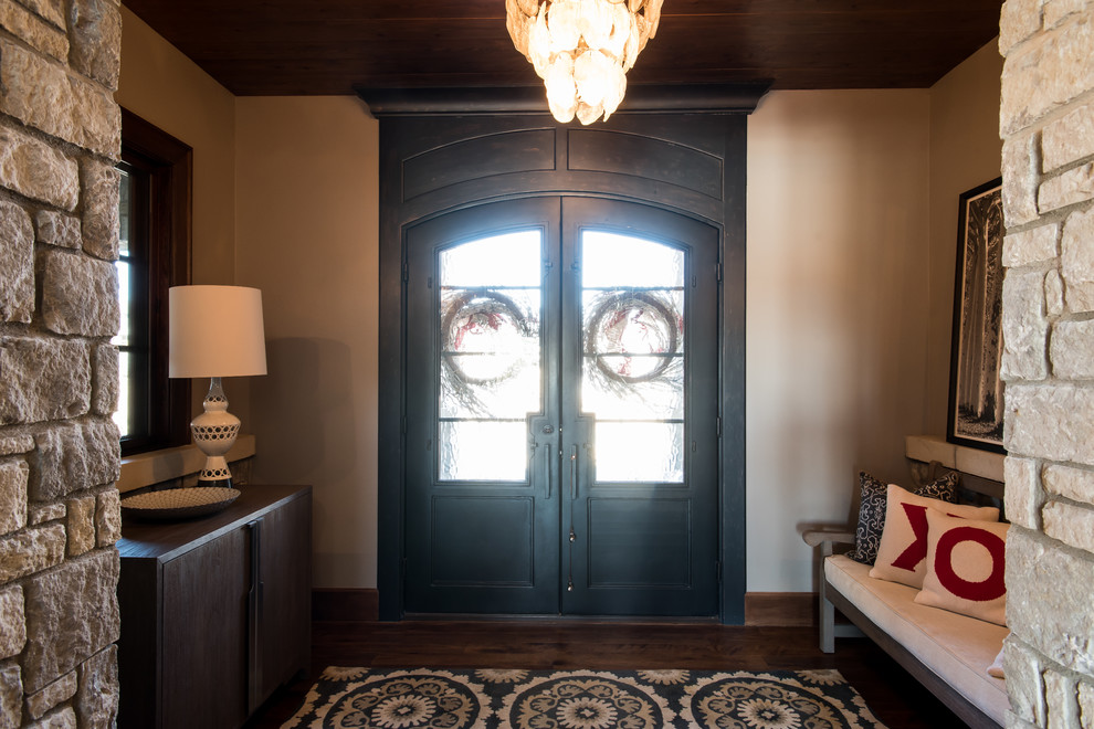 Mid-sized transitional medium tone wood floor foyer photo