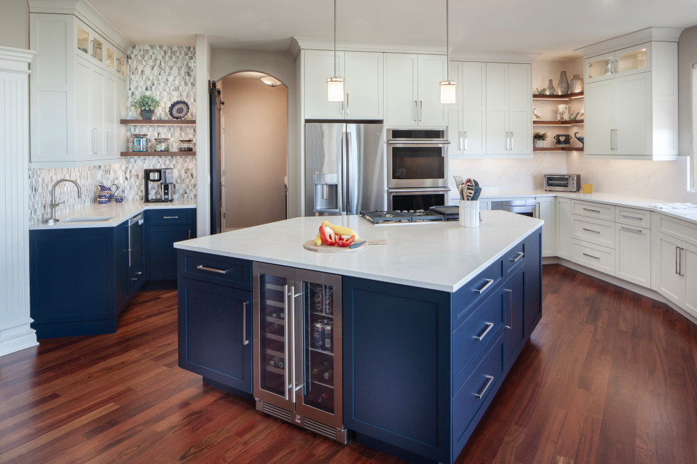 Example of a transitional kitchen design in Denver