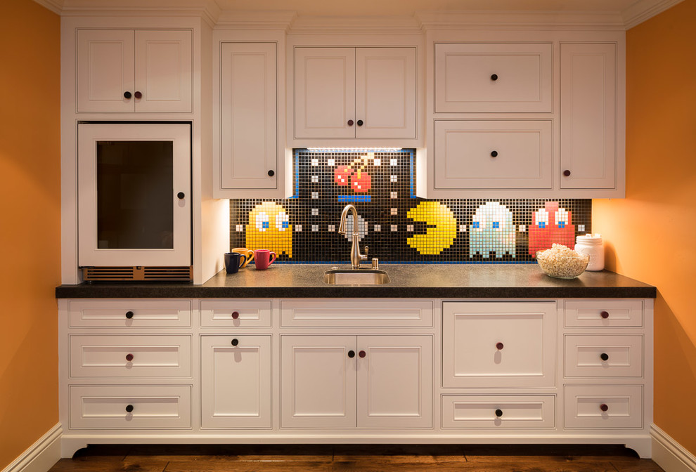 Transitional walk-out medium tone wood floor basement photo in San Francisco