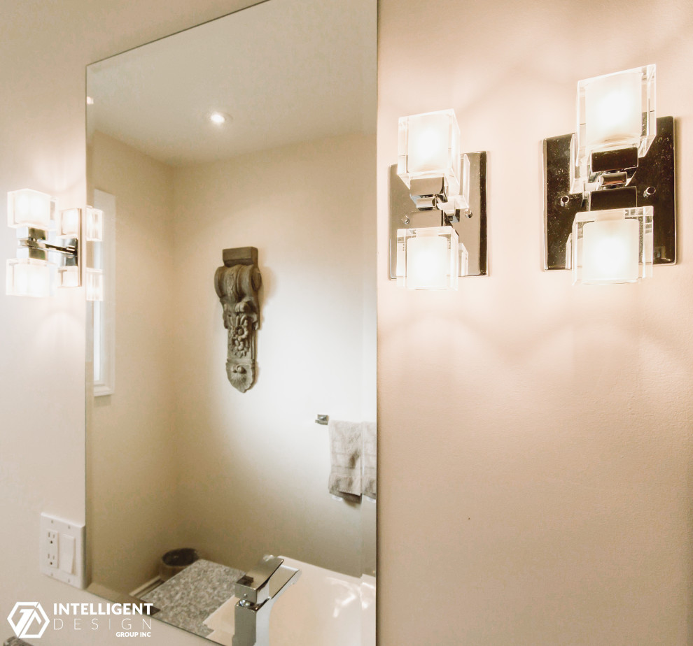 Inspiration for a mid-sized transitional master beige tile and ceramic tile porcelain tile, beige floor and double-sink alcove bathtub remodel in Toronto with flat-panel cabinets, dark wood cabinets, a one-piece toilet, pink walls, a vessel sink, marble countertops, a hinged shower door, gray countertops and a freestanding vanity